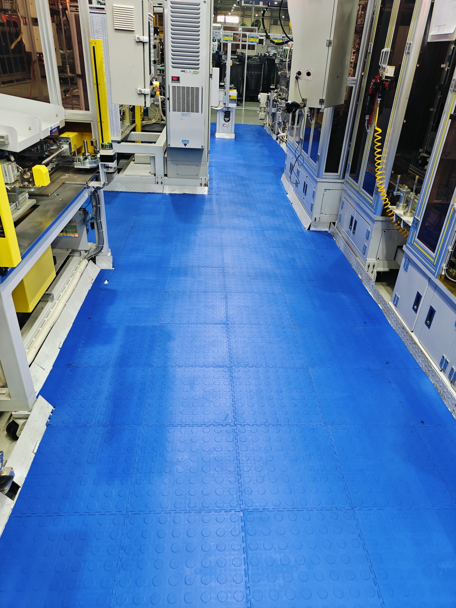 Home 17 Tiepro blue interlocking tile floor in an automotive components MNC assembly line, Chennai